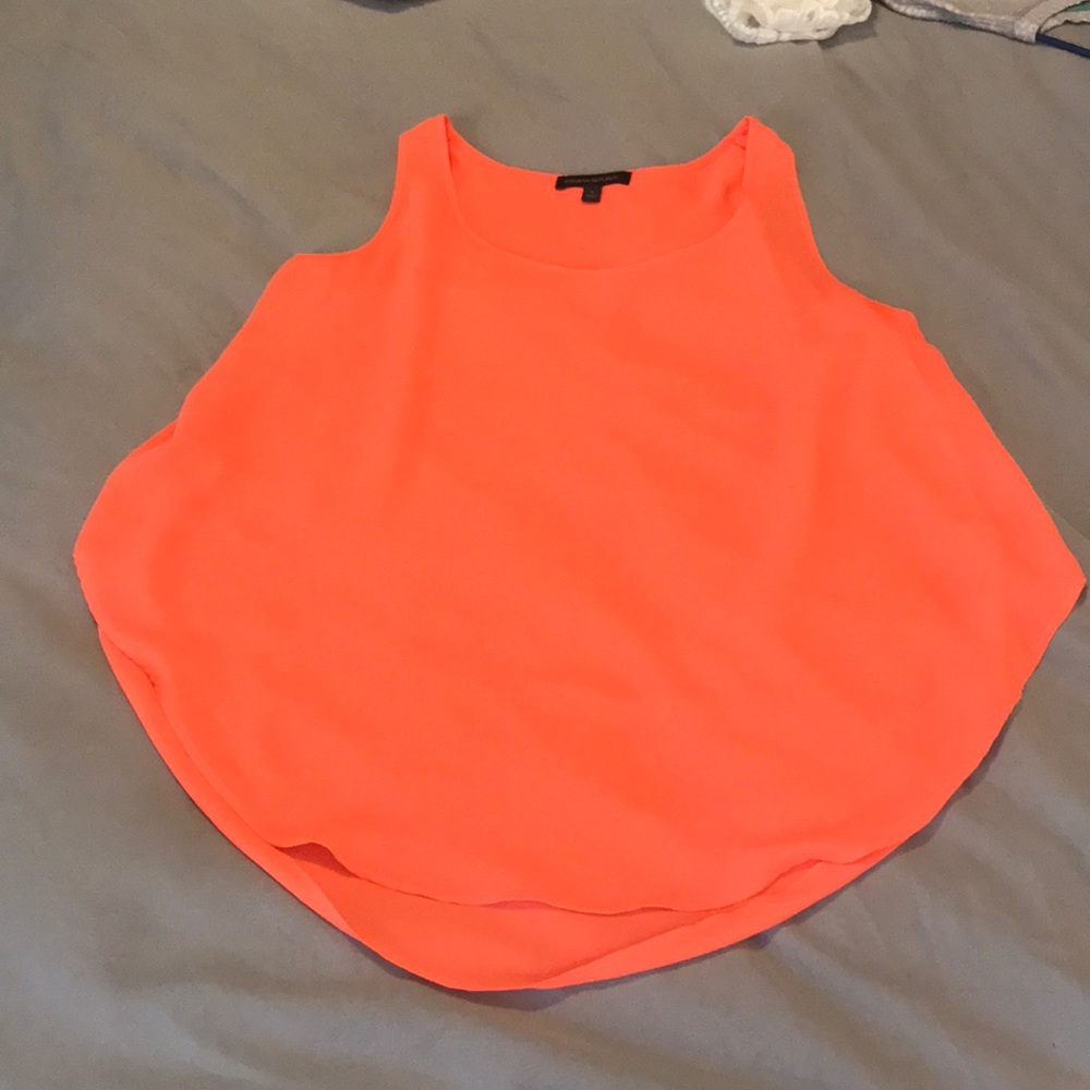 Sleeveless flutter-back blouse